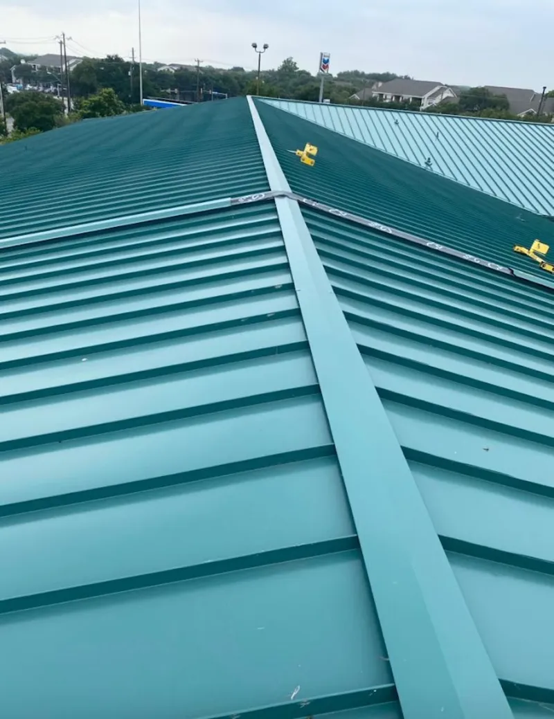 Green commercial metal roof ridge and valley for Metal Roof Repair in Druid Hills